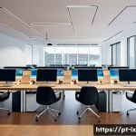 RESTful API 설계 모범 사례 - A sleek, modern office workspace with a diverse team of software developers collaborating around a l...